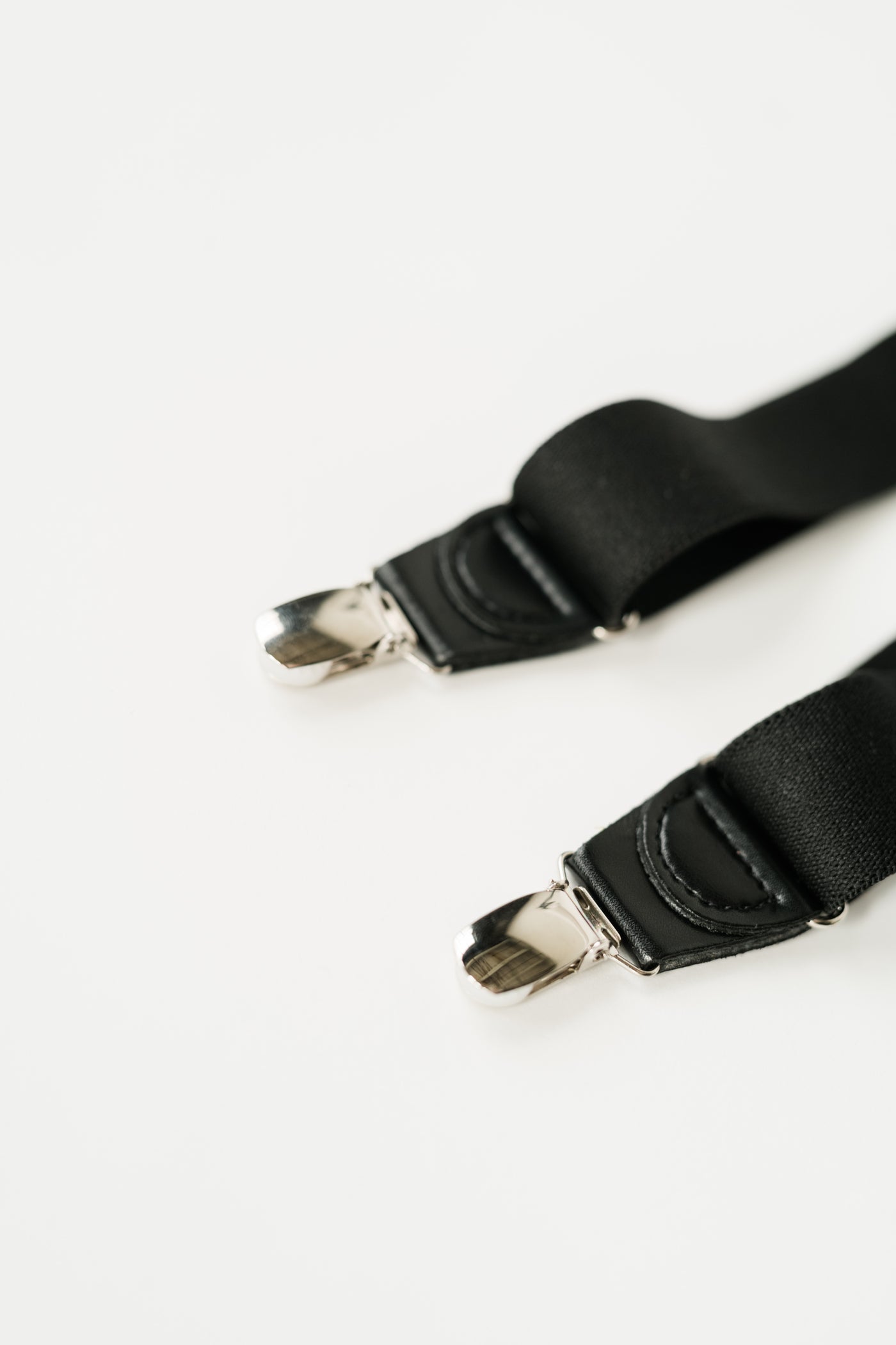 silver metal suspender clips