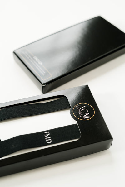 black gift box with monogram suspender